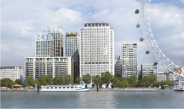 The view from across the river shows the scale of the development