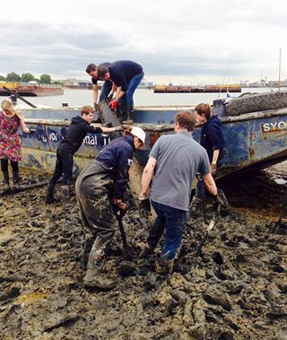 Being dug out of the mud