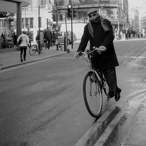 Riding a bicycle with distinction by Ian Brumpton