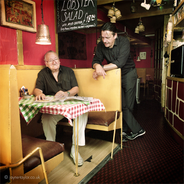 Aldo &amp; Alberto, at Trattoria da Aldo, Greek Street. Aldo lives in Soho and has been running his Italian restaurant in Greek Street for 35 years; he’s a familiar sight to passers-by, usually seated at his favourite table outside. Pictured here with son Alberto, who now manages the trattoria.