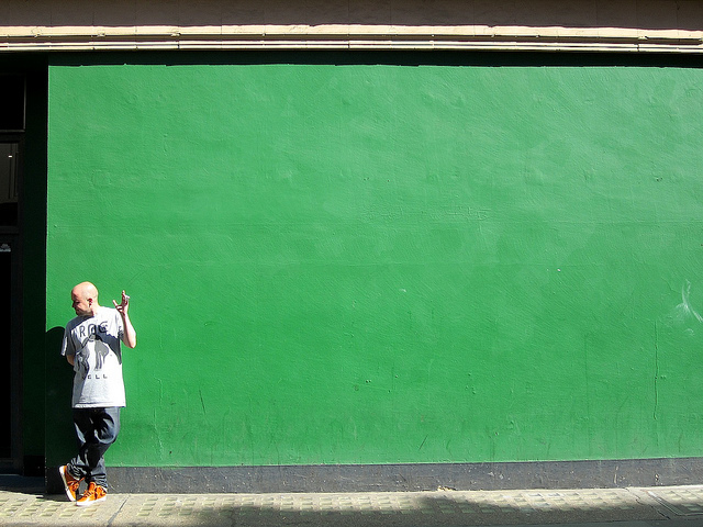 Green wall in Berwick Street back in 2012, by Andy Worthington on Flickr. 