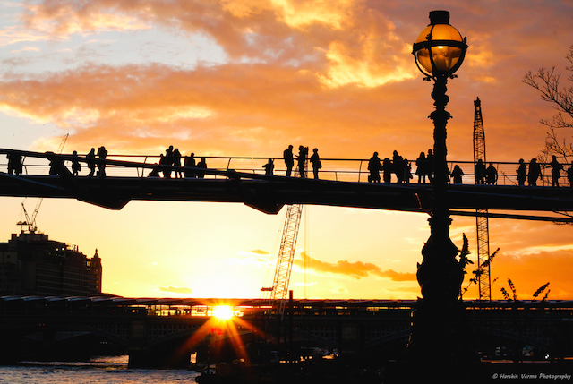 Which panoramic side of the Millennium Bridge do you prefer, St Paul's cathedral or Tate Modern? This is the bridge at sunset, photo by Harshit Verma on Flickr