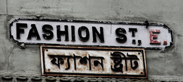 Fashion St near Spitalfields. Many signs in this area are bilingual, in English and Bengali. Image: Stephanie Sadler.