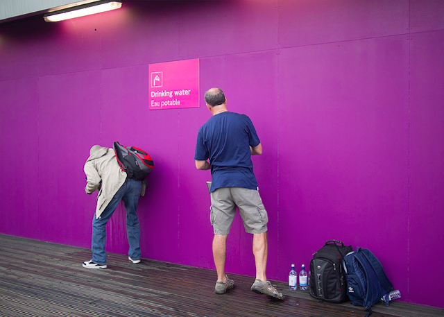 Purple wall in Stratford, by Magic Pea