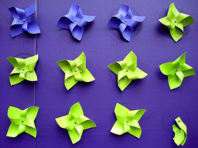 Street art back in 2007, with a purple background, by Michael Reeve