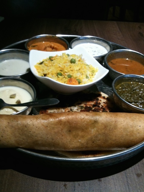 Thali with dosa and other dishes.