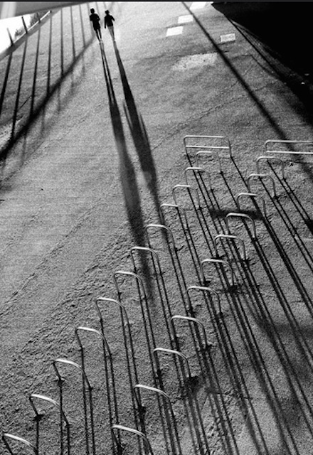 Shadowy cycle racks. Photo by Mark.