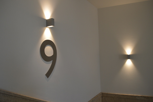 Much of the renovation concerned itself with restoring original features. New interventions, such as the floor numbers and lighting, are in complementary style. Indeed, the number font is Gill Sans, developed by Eric Gill who worked closely with the BBC.