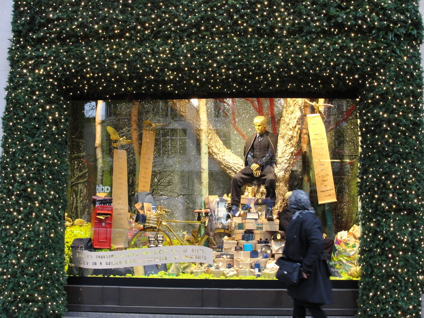 Selfridges has put a pensive-looking guy in a tree.