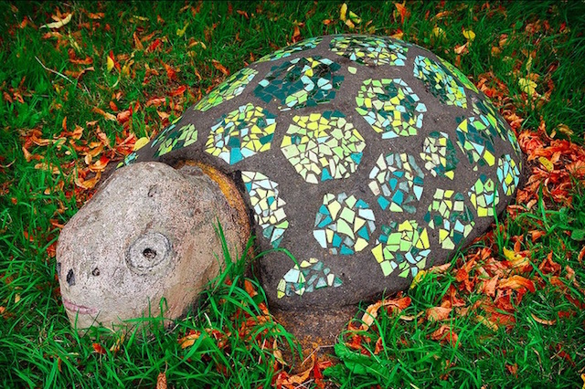 This tiled creature sits in Robin Hood Gardens in Poplar. Photo: Compound Eye (2014)