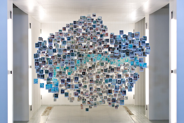 LONDON, ENGLAND - MARCH 01:  Artist Damilola Odusoste and students from Central Saint Martins unveil an original  'Made by you' installation, assembled from thousands of Chuck Taylor fans' polaroids on March 1, 2015 in London, England.  (Photo by Ben A. Pruchnie/Getty Images)