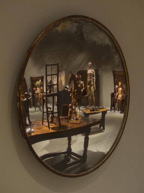 These mirrors surround the exhibition, casting a distorted view. Photo: Robert Keziere