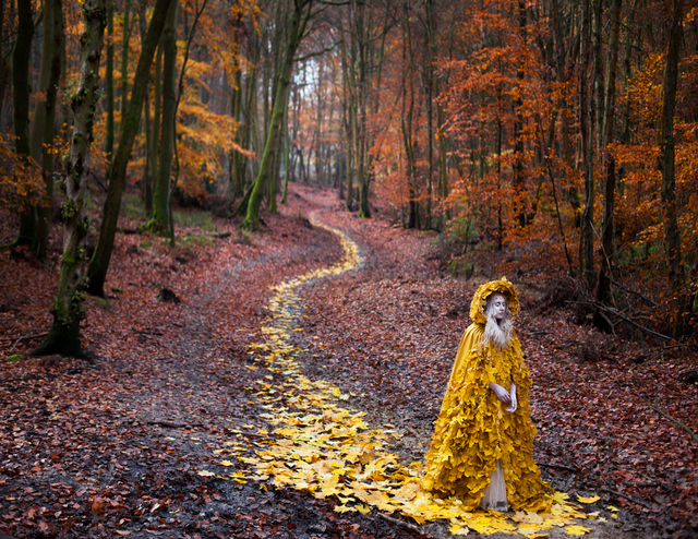 There's something of a sad procession to this image, despite the bright colours. Copyright Kirsty Mitchell 
