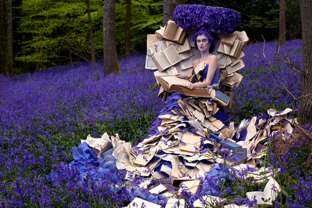 A self-referential image where a fairytale image is embellished with books. Copyright Kirsty Mitchell