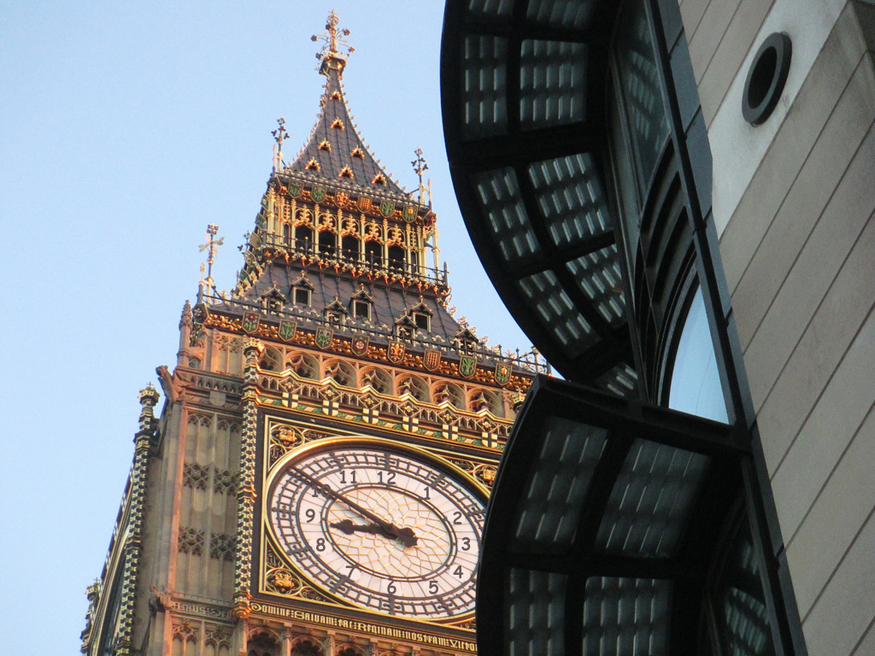 Big Ben clock face with Comic Sans numbers instead of Roman numerals.