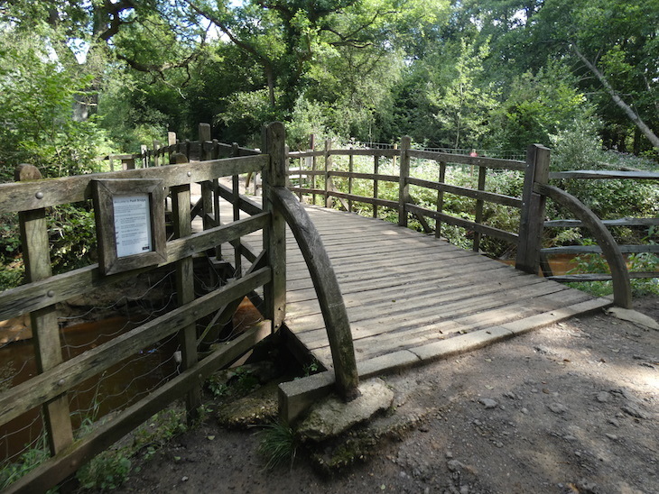The wooden Pooh Sticks bridge over a stream