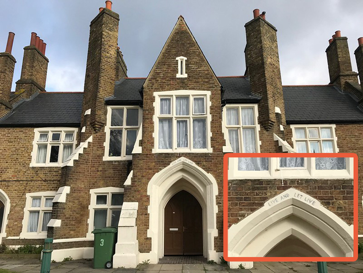 Live and let Live says the motto over the doorway to some brown-brick almshouses