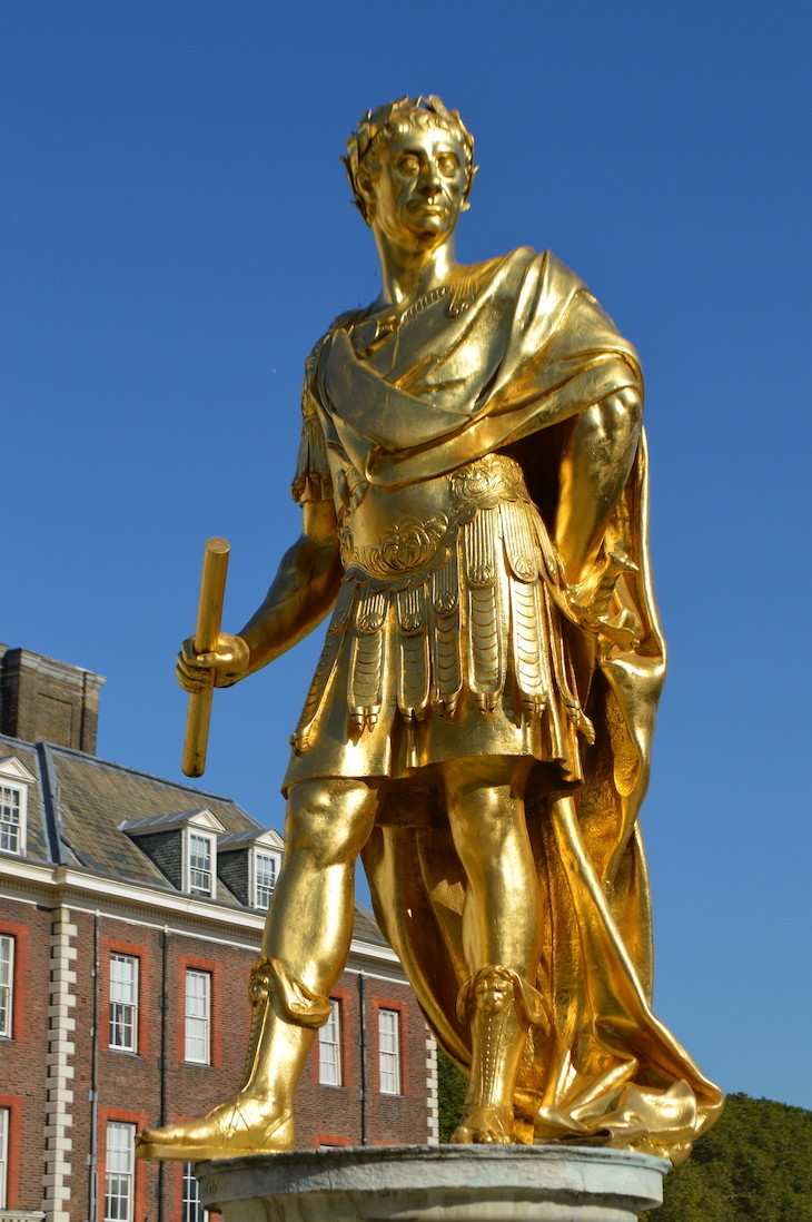 A golden statue of Charles II dressed as a Roman emperor