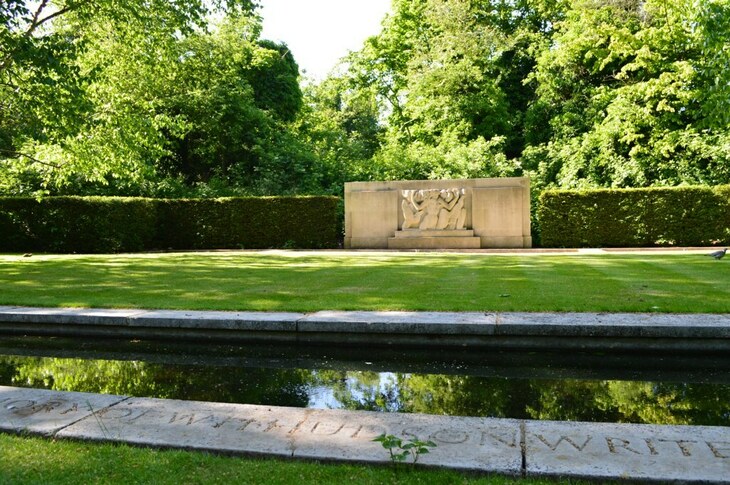 The Hudson Memorial in a lush green garden