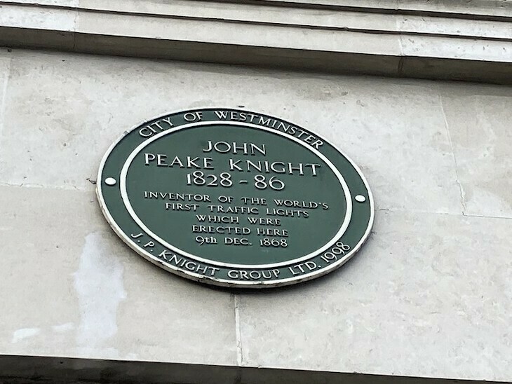 Traffic lights plaque in Westminster remembering John Peake Knight