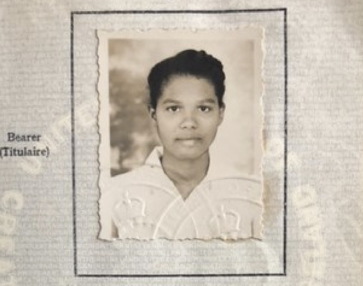 An old passport with a young Joan's photo on it