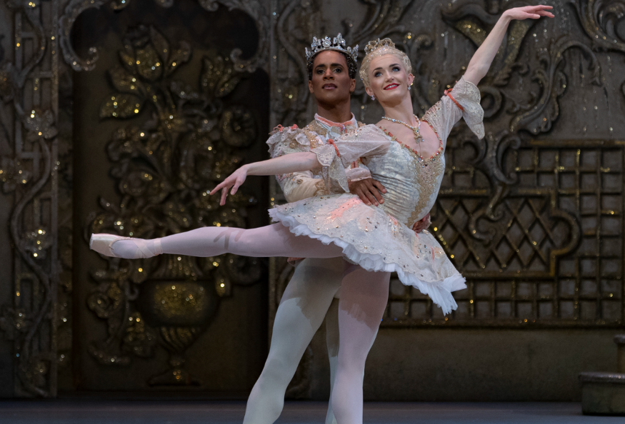 Two ballerinas performing The Nutcracker in costumer