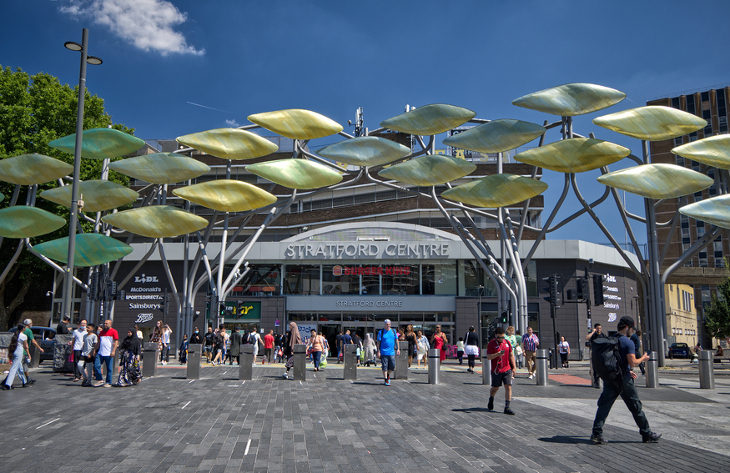 A shoal of metal fish in front of the Stratford Centre