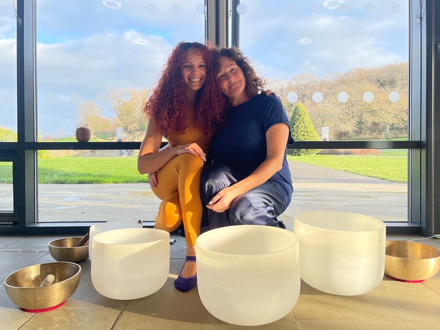 Two women at a sound bath