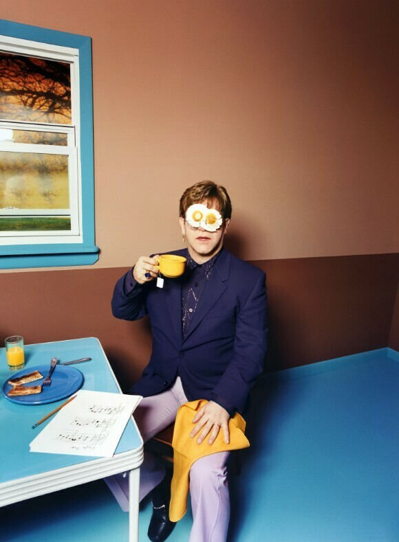 Elton John with fried eggs for eyes