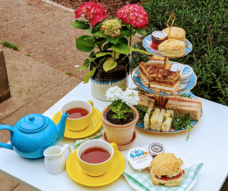 Best budget afternoon tea London: A table in a garden set for afternoon tea
