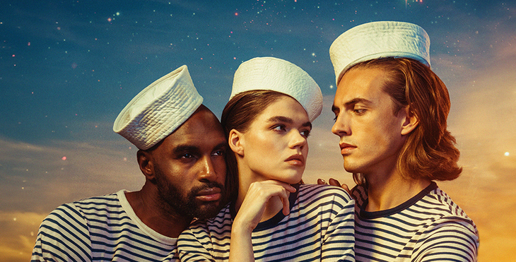 Three young people in sailor outfits