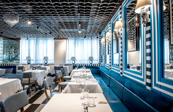 The interior of Kanashka, a light and airy space with blue and white decor