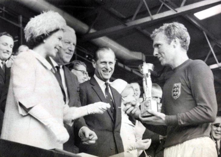 Pickles the dog World Cup: The Queen presents the retrieved trophy to Bobby Moore n summer 1966.