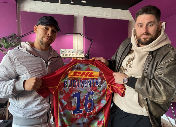 Rudimental holding up a Harlequins rugby shirt