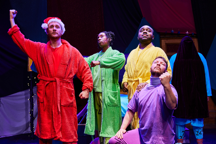 Actors in brightly coloured dressing gowns