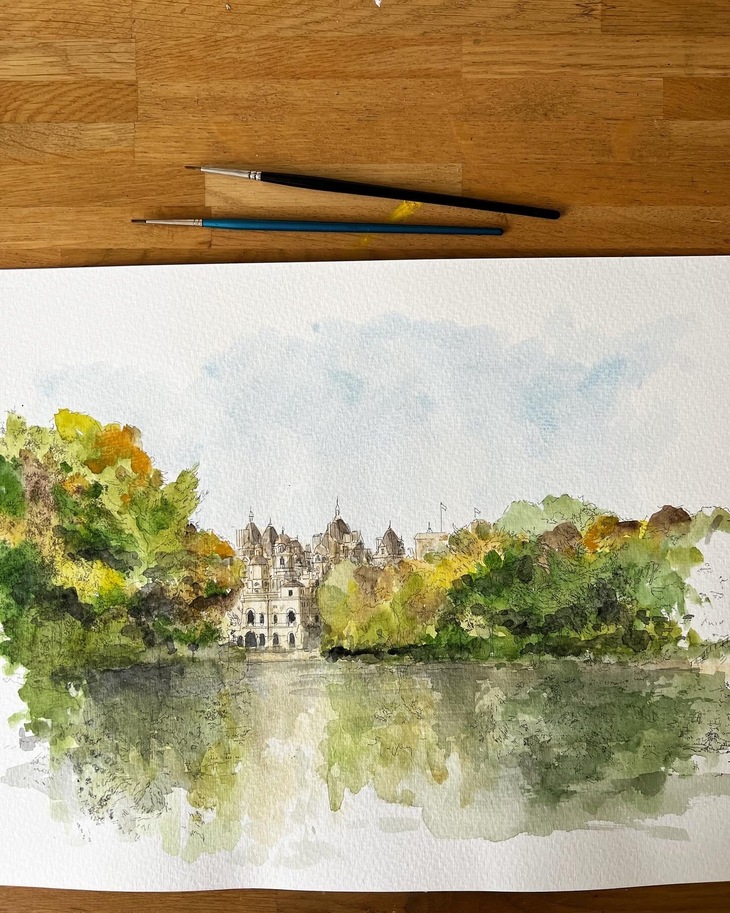 A park with a lake in the foreground