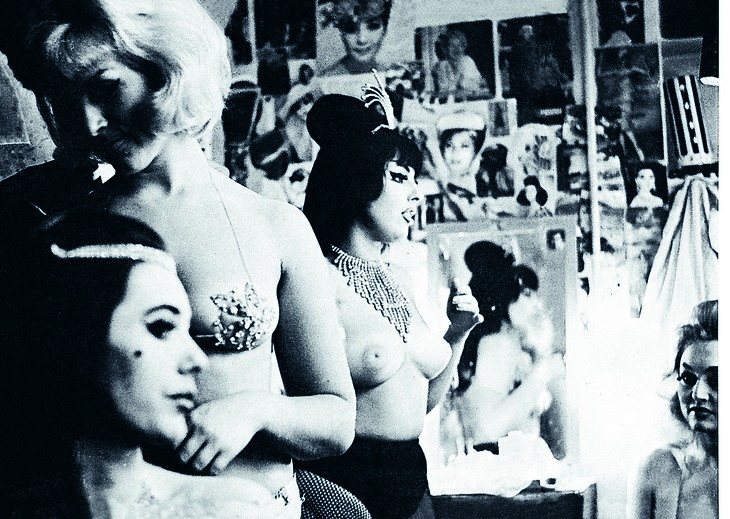 Half naked showgirls preparing for a performance