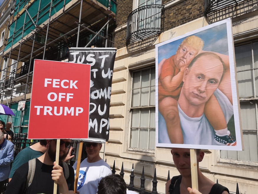 Stop Putin Stop Trump demo: A placard showing Trump on Putin's shoulders