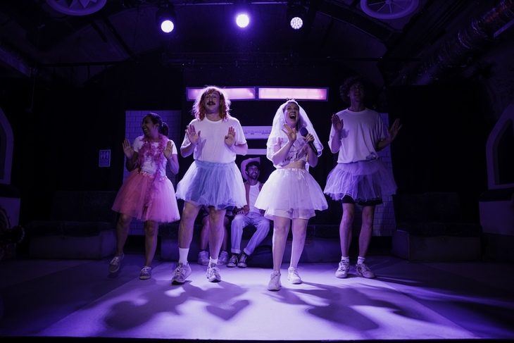 Cockfosters play: people in tutus dancing on stage