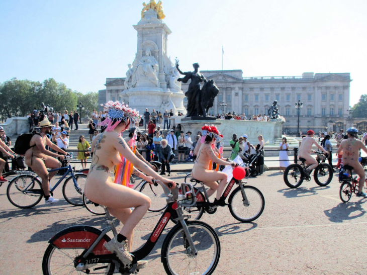 World Naked Bike Ride London 2025: cyclists riding nude around the Victoria Memorial outside Buckingham Palace