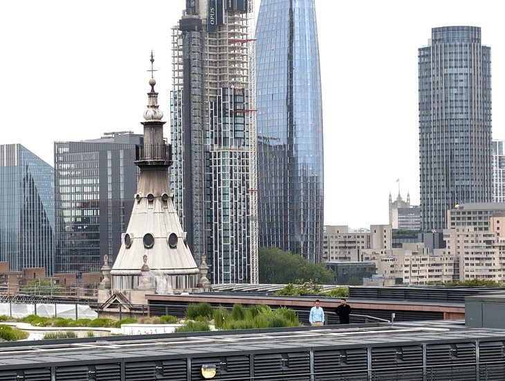 A roof garden with high rises in the background