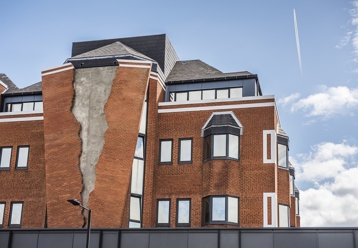 A building that looks like it's splitting down the sides