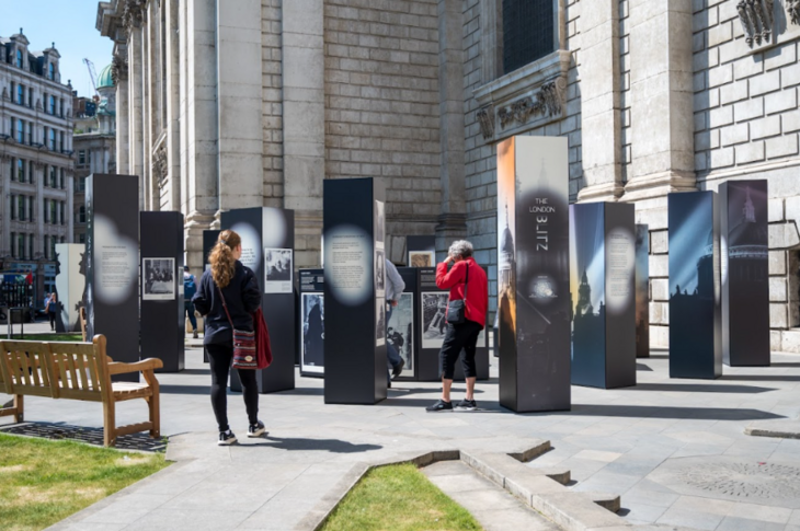 People looking at an outdoor exhibition