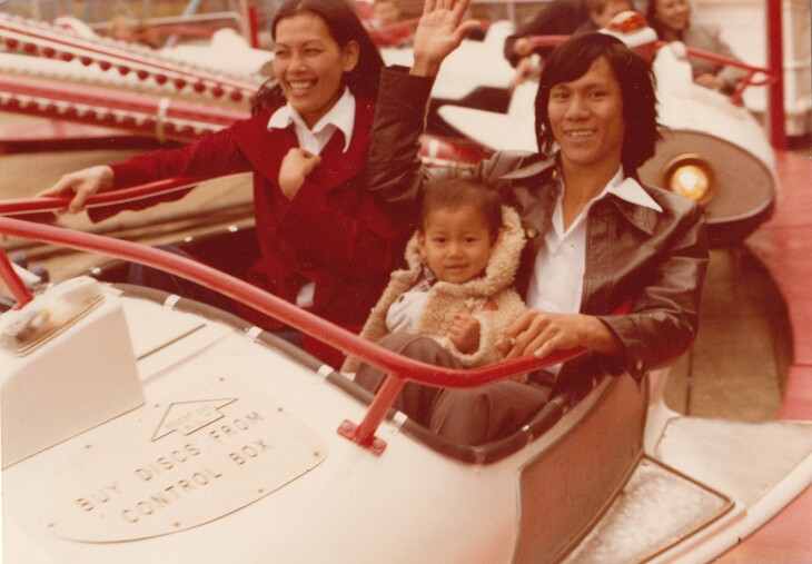 Old photo of a family on a roller coaster