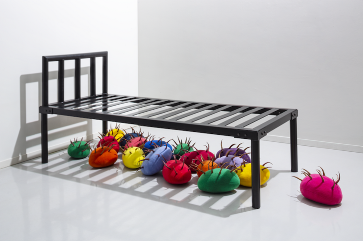 Colourful squishy things under a bed