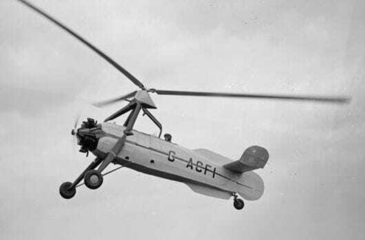 An autogyro in a black and white image