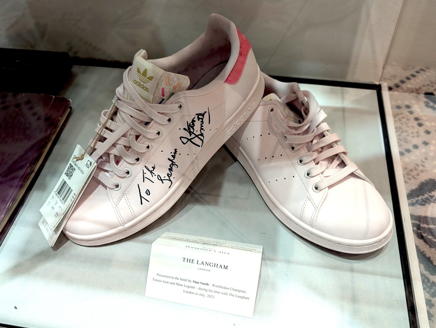 A pair of signed trainers