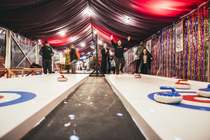 People playing curling