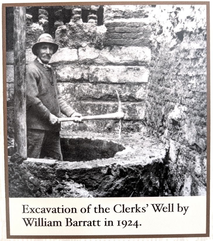Photo of someone excavating the well