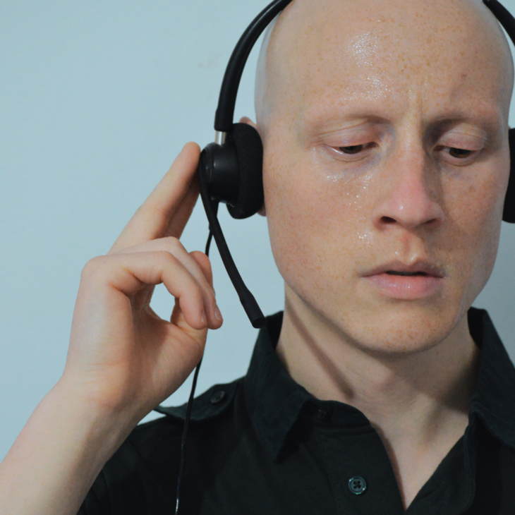 A person with a headset on